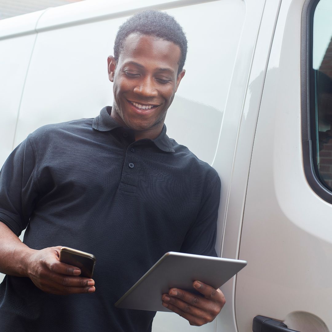 plumber looking at tablet