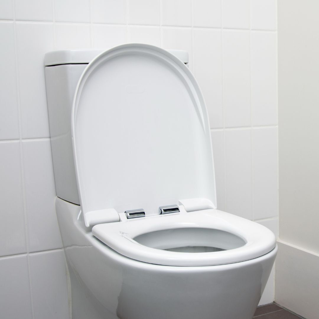 a white toilet in a bathroom