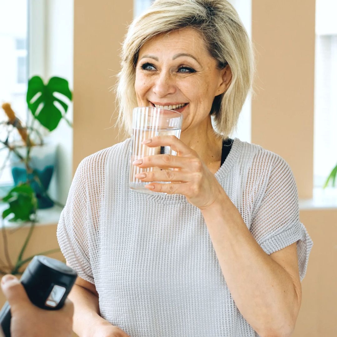 Woman drinking a glass of water